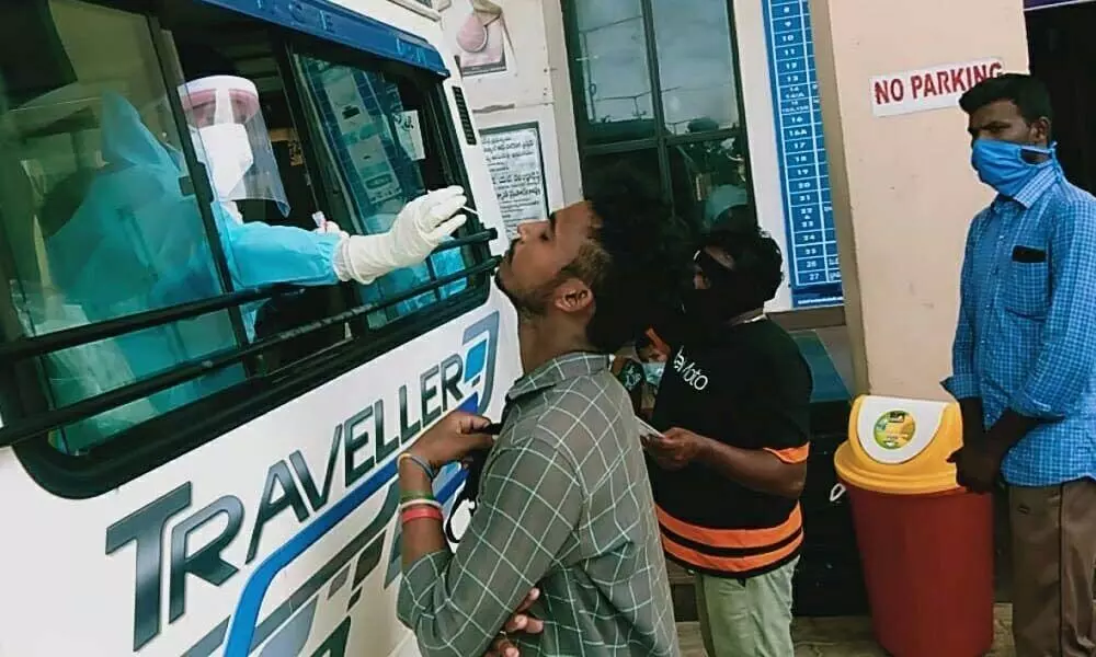 Samples collecting from a person through mobile unit at Srikakulam