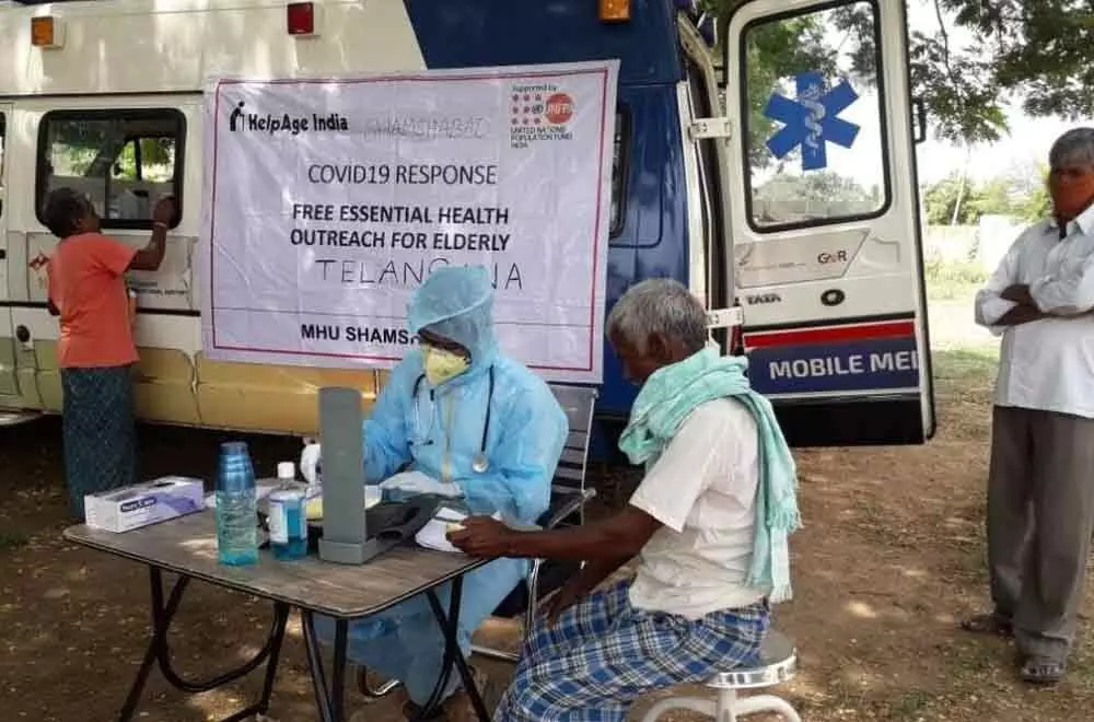 GMRVF distributes medicines to old people
