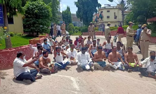 Travel operators hold shirtless protest demanding relief