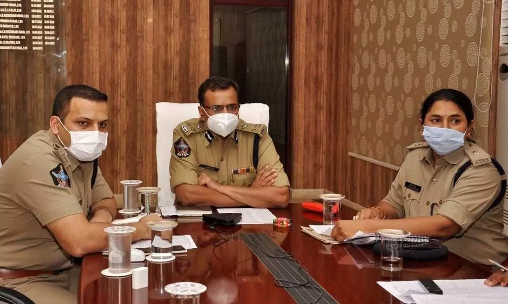 Guntur Range IG J Prabhakar Rao and SP Siddharth Kaushal speaking to police personnel and their family members