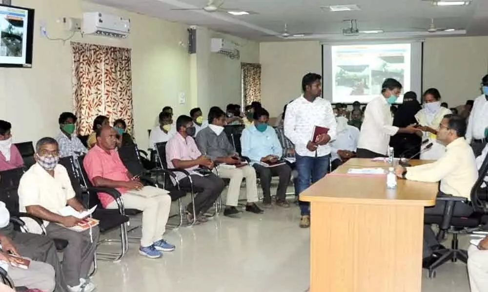 District Collector Musharraf Ali Faruqui speaking at a review meeting on the construction of rythu vedika at the Collectorate’s conference hall in Nirmal on Monday