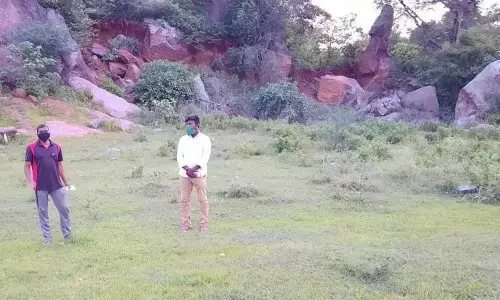 Two constables, who were tested corona positive, spending time in the hillocks near Mahabubabad on Tuesday