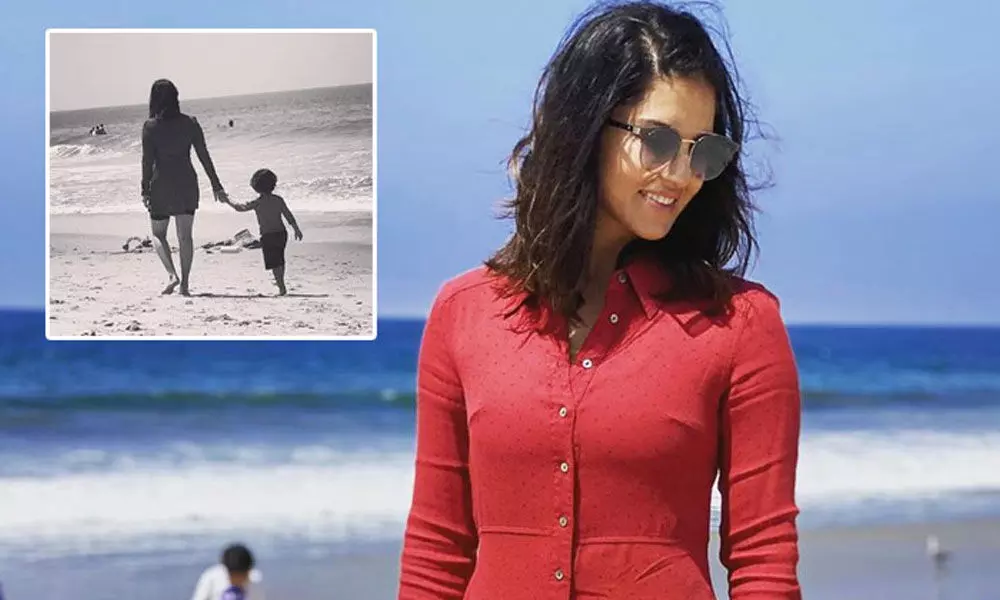 Sunny Leone and her ‘little nugget’ take a stroll on the beach
