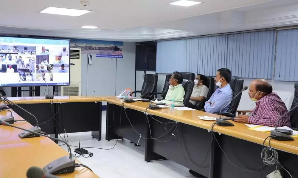 SCCL Directors speaking to Company General Managers through a video conference from Hyderabad on Tuesday