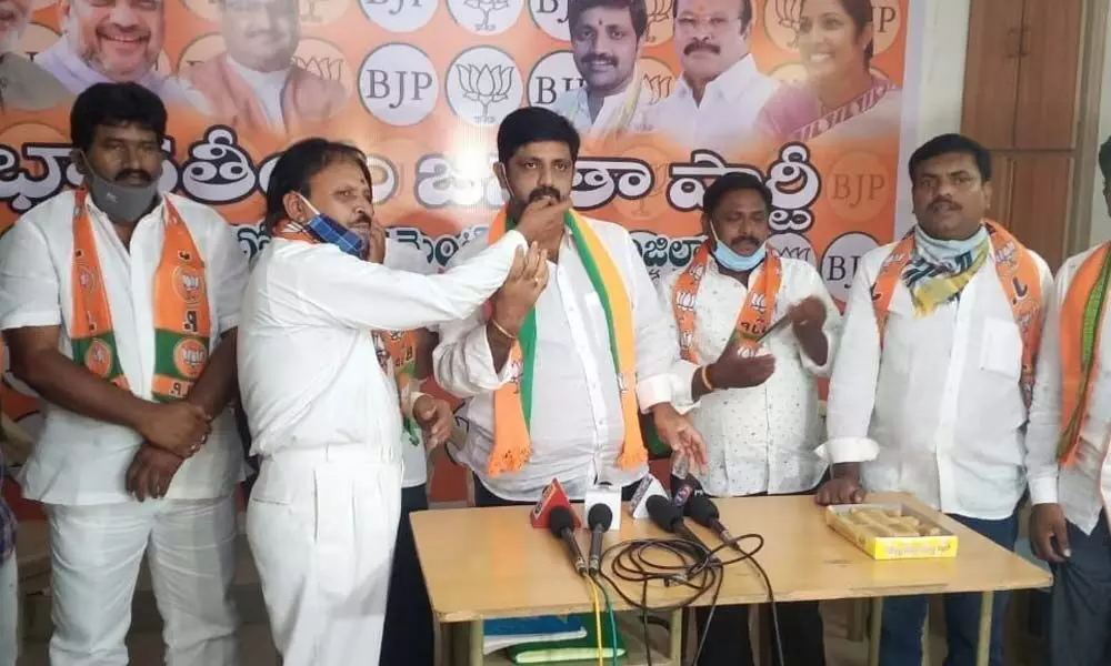BJP local leaders celebrating the appointment of Somu Veerraju as BJP State president in Ongole on Tuesday
