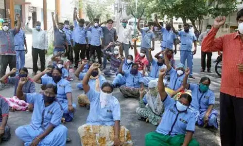 Contract workers staging a protest at the District Government Hospital