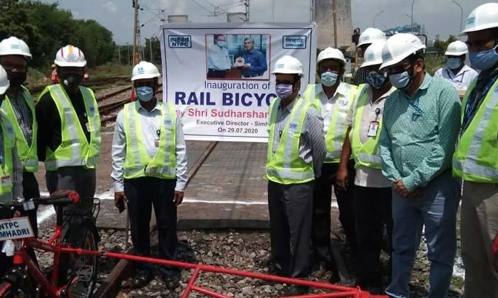 NTPC Simhadri staff with Rail Bicycle
