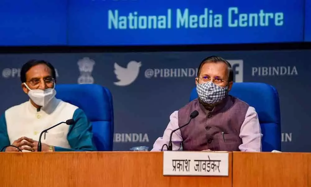 Union Ministers Prakash Javadekar and Ramesh Pokhriyal Nishank (L)  during a press conference, at NMC in New Delhi on Wednesday