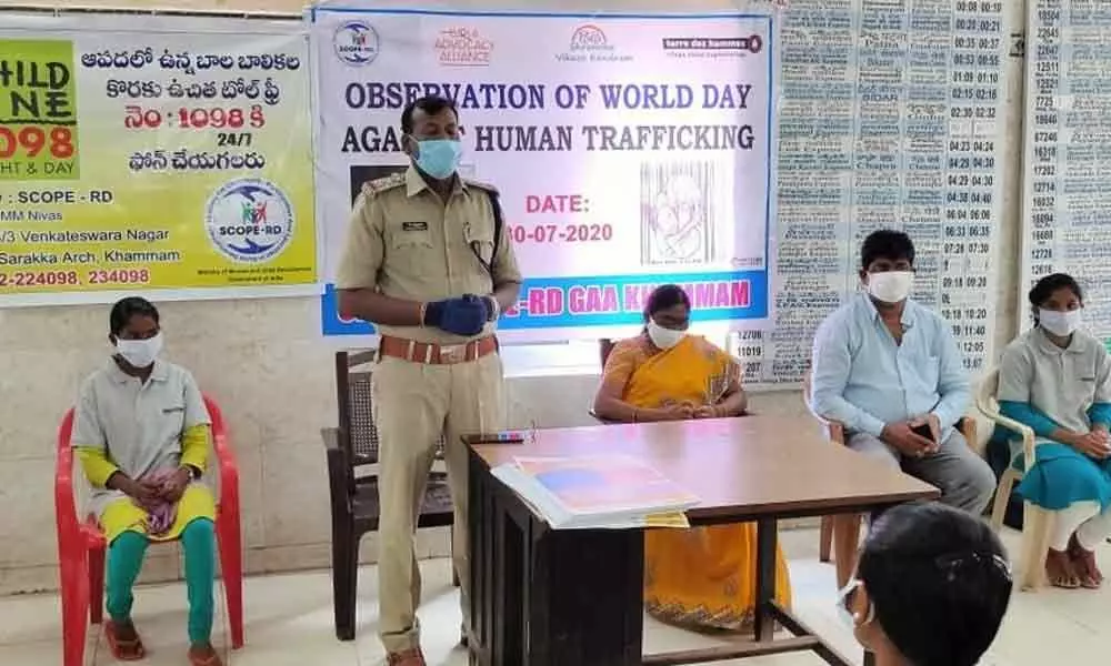 RPF Circle Inspector K Madhusudhan speaking at a meeting held on World Day Against Human Trafficking in Khammam on Thursday
