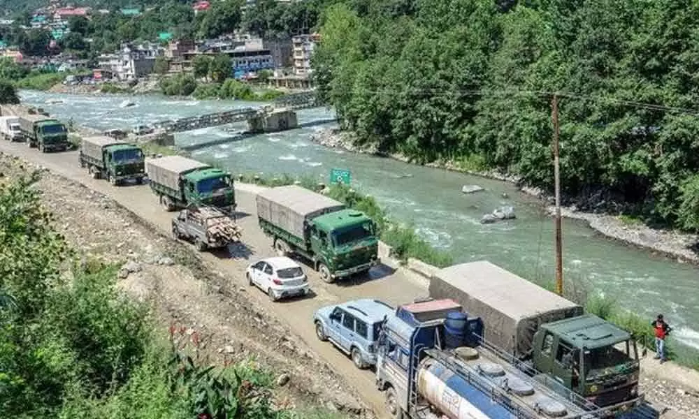 Army trucks move towards Ladakh amid LAC border tension, at Manali-Leh highway in Kullu