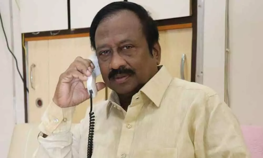Mayor Gunda Prakash Rao holding teleconference with municipal officials from his camp office on Saturday