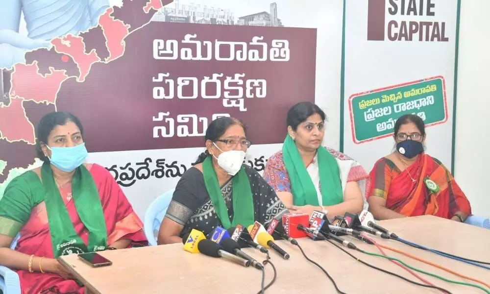 CPI leader Akkineni Vanaja flanked by TDP leader Gadde Anuradha and Congress leader Sunkara Padmasri