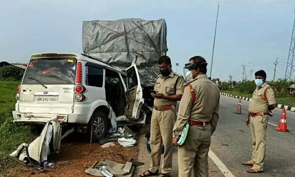 Police inspecting the accident spot at Jalantarakota in Kanchili mandal, which claimed three lives on Sunday