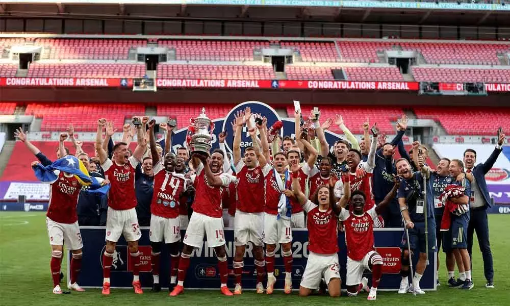 Aubameyang brace helps Arsenal bag 14th title