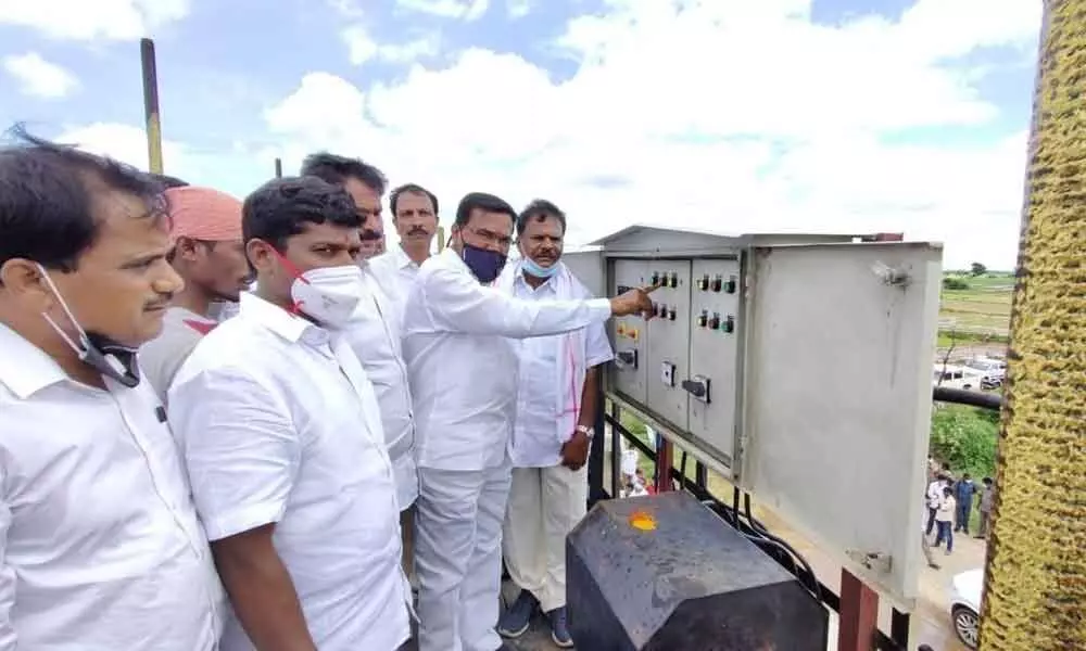 cAgriculture Minister Singireddy Niranjan Reddy switching on the gate motors to release water from Gudipally reservior on Sunday