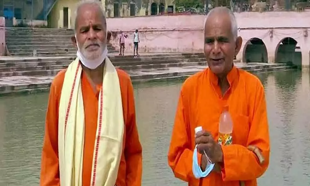 Two brothers, both in their 70s, have collected water from 151 rivers across the country and three seas