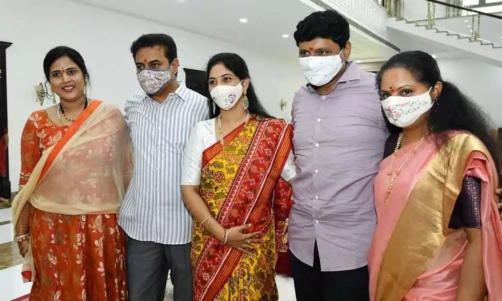 Former MP Kalvakuntla Kavitha along with her brother and IT Minister KT Rama Rao and Rajya Sabha Member Joginipally Santosh Kumar after tying rakhi in Hyderabad on Monday. KTR’ wife Shailima (first from left) and Santosh’s sister Soumya (middle) also seen