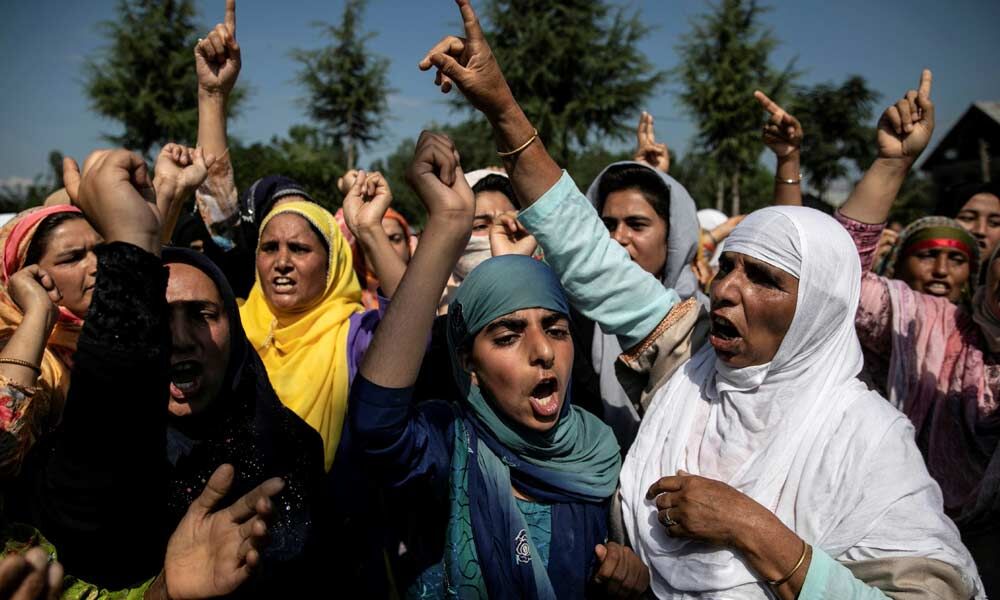 With a heavy hand, India rides out Kashmir's year of disquiet