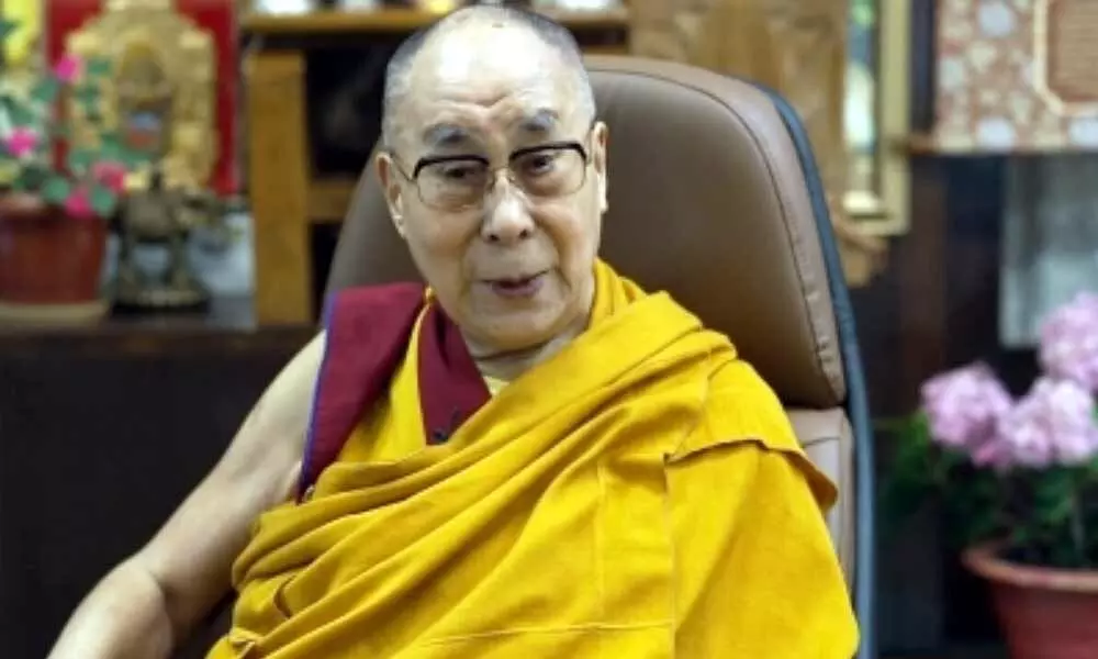Dalai Lama mourns fellow Nobel laureate John Humes demise