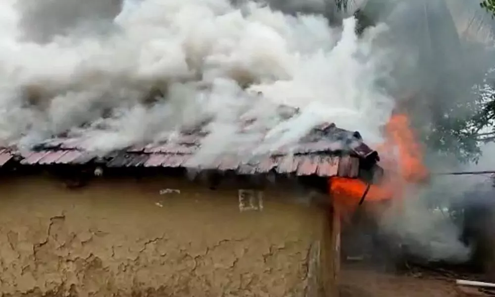 The torched house following a land dispute in Routhugudem Thanda on Tuesday