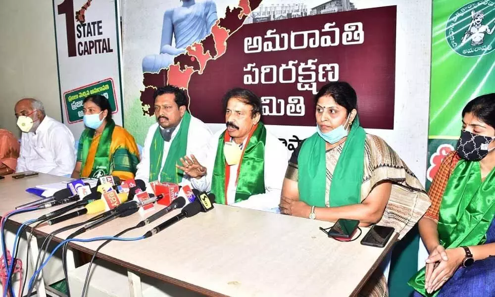 CPI leader Ramakrishna, flanked by Amaravati JAC convener R V Swamy, Congress leader Sunkara Padmasri, Gadde Anuradha, Dr Sailaja