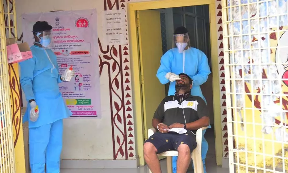 Basti Dawakhana centre carrying out Covid testing in Cherlapally on Wednesday.	Photo: Adula Krishna