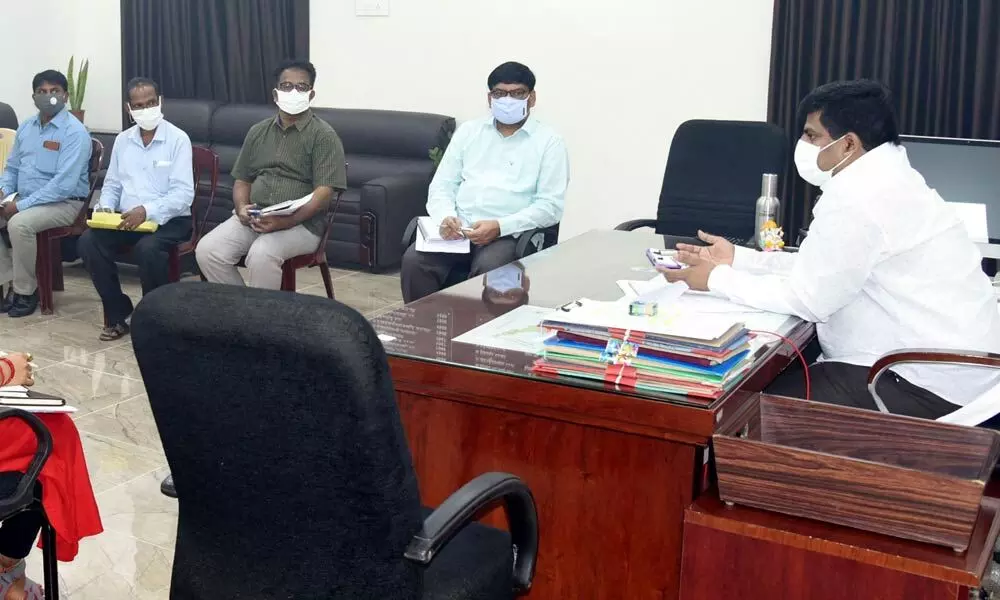 West Godavari District Collector R Mutyala Raju holding a meeting with officials in Eluru on Wednesday
