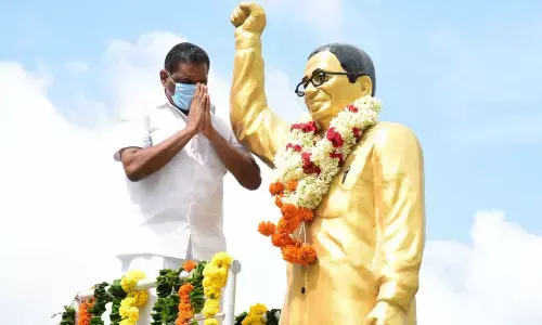 City Mayor Y Sunil Rao paying tributes to Prof K Jayashankar at Karimnagar Municipal Corporation office on Thursday