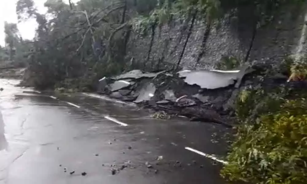 Rains lash Mumbai, a landslide at Malabar Hill