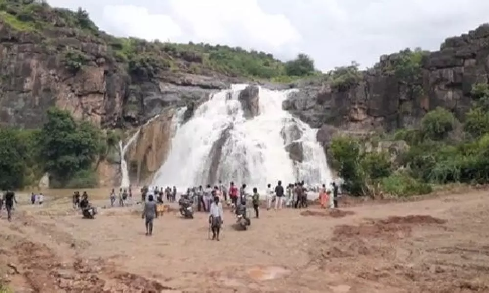 Vistors enjoying at Mangampeta waterfalls