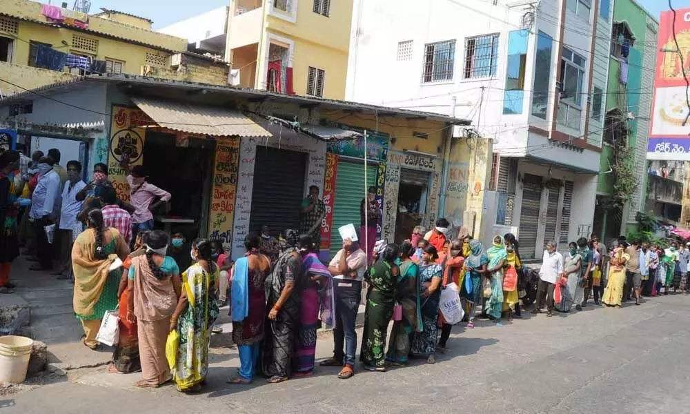 A crowded ration shop in the city limits