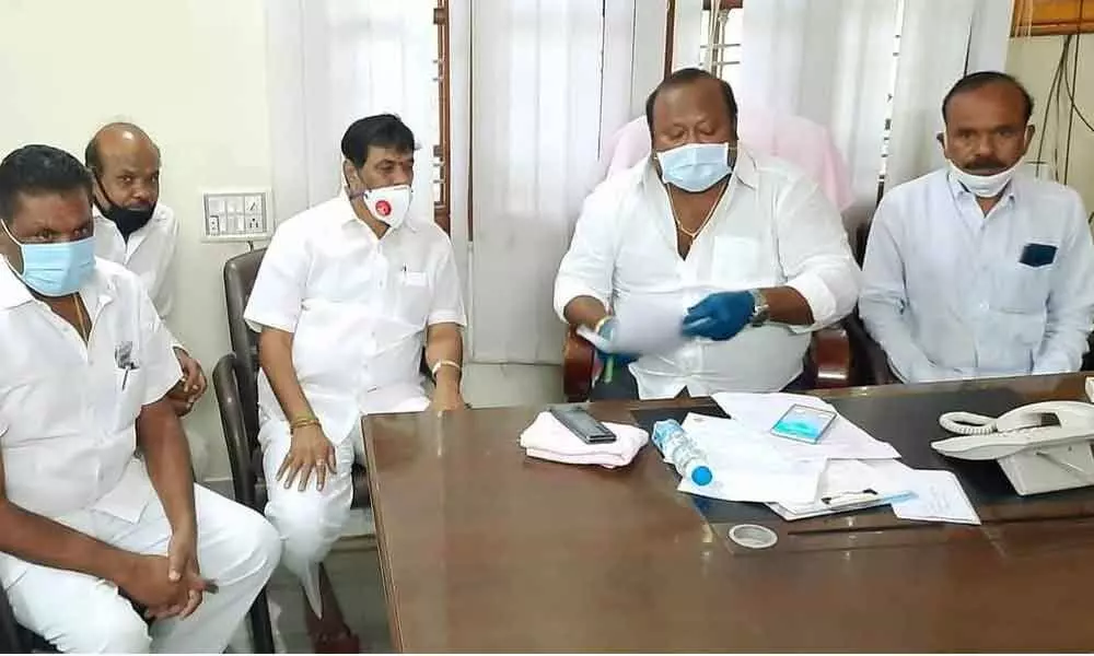 BC Welfare and Civil Supplies Minister G Kamalakar discussing about municipal committees with party leaders at Minister’s camp office in Karimnagar on Friday