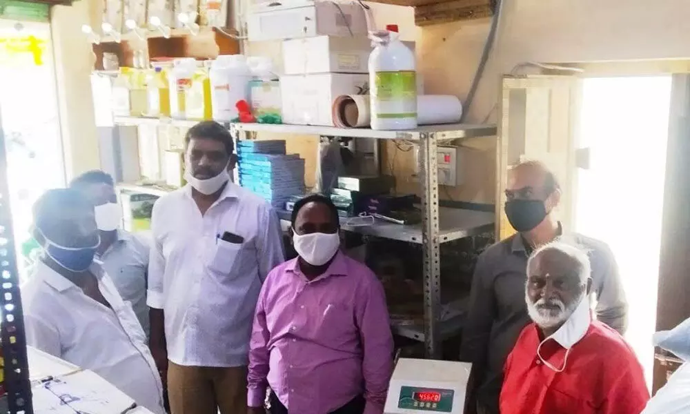 Officials conducting raid on a fertiliser shop at Perecherla in Guntur district on Friday