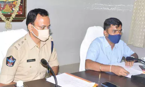 District Collector N B Gupta and SP Senthil Kumar addressing media at Kanipakam temple in Chittoor on Saturday