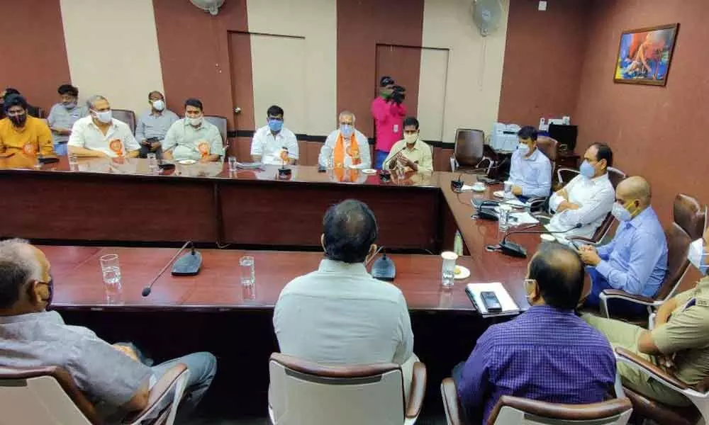 MLA Bhumana Karunakar Reddy and Municipal Commissioner Girish and SP Ramesh Reddy participating in a meeting with Vinayaka Nimajjana commitee members at municipal office in Tirupati on Saturday