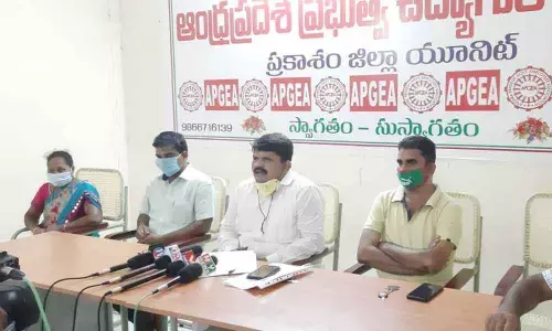 APGEA Prakasam district unit leader Vinukonda Rajarao and others speaking at a press meet in Ongole on Sunday