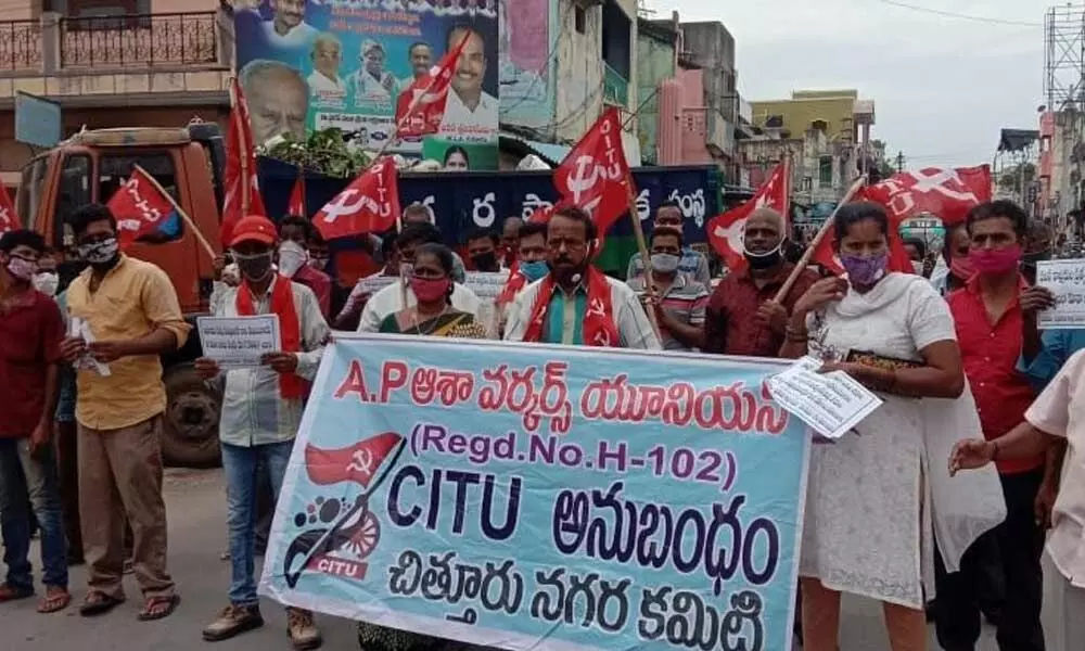 CITU  leaders staging a dharna in Chittoor on Sunday