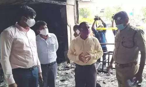 Probe committee members visiting Swarna Palance hotel on Monday