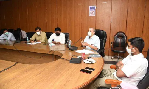 District Collector Dr N Bharat Gupta at a review meeting with private doctors in Tirupati on Tuesday. SVIMS general medicine  HOD Dr Alladi Mohan is also seen.