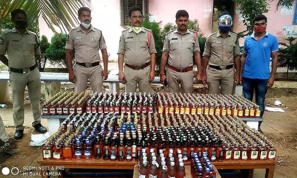 Liquor bottles seized at Tagarapuvalasa in Visakhapatnam on Tuesday