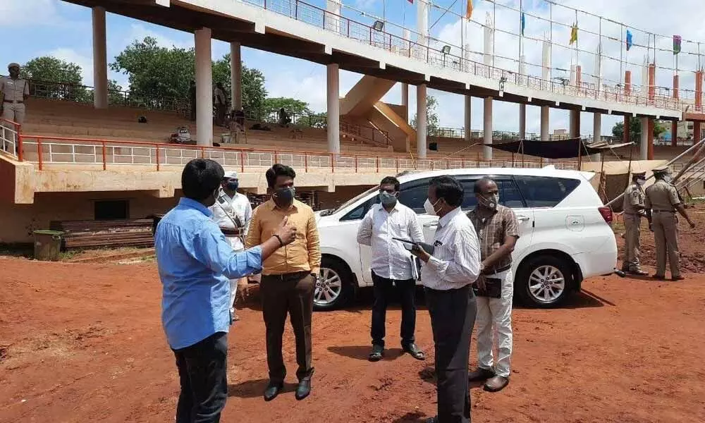VMC Commissioner Prasanna Venkatesh inspecting arrangements being made at the IGMC Stadium for the Independence Day celebrations