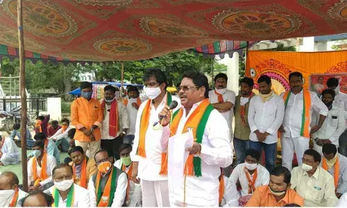 MP Soyam Bapu Rao speaking at a maha dharna at RIMS Hospital in Adilabad on Wednesday