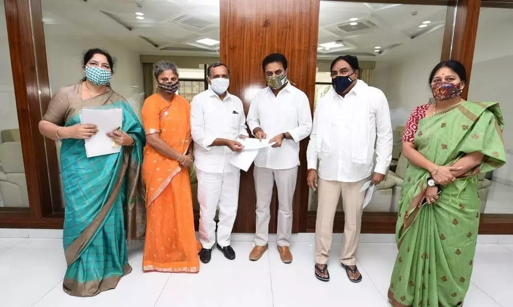 Minister for MA&UD, KT Rama Rao receiving cheque under the tag ‘Gift a Smile’ in the presence of Minister for PR and RD Errabelli Dayakar Rao and Minister for ST Welfare, Satyavathi Rathod