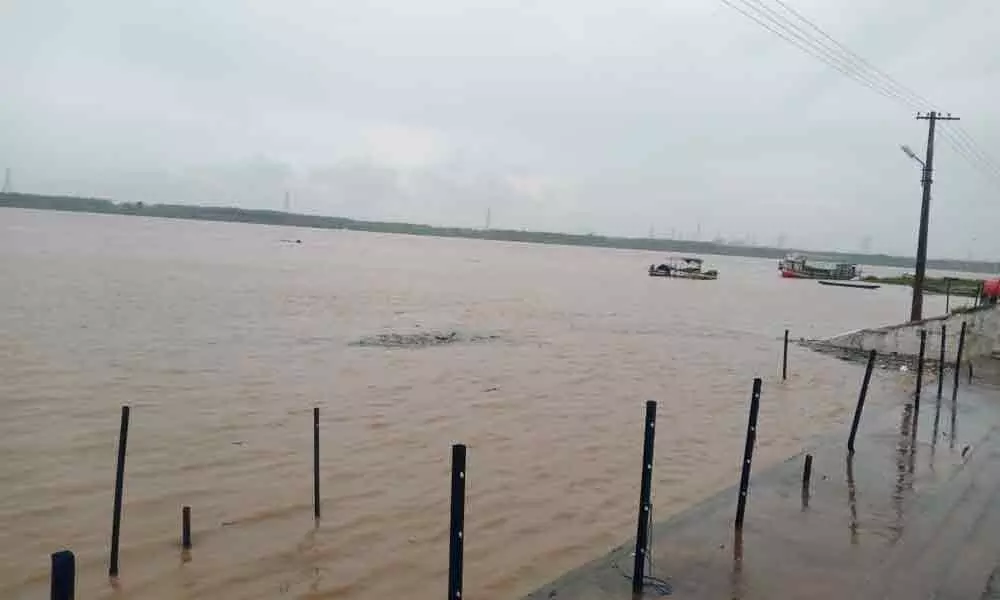 Godavari water reaching the bathing steps at Bhadrachalam on Wednesday