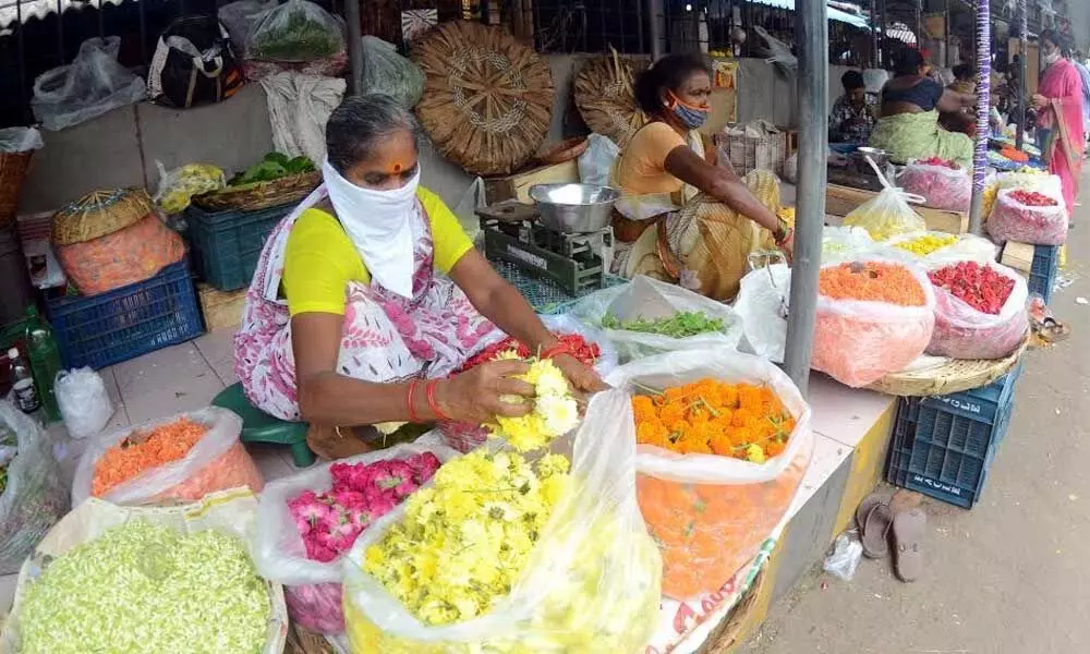Flower vendors at Poorna market in Visakhapatnam
