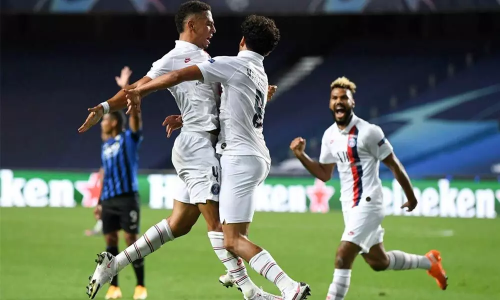 Two late goals help PSG oust Atalanta in Champions League quarters
