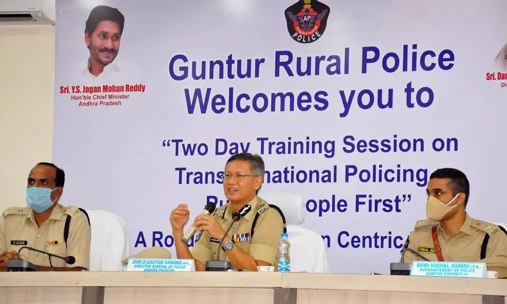 DGP Damodar Gautam Sawang addressing a meeting at the DPO in Guntur city on Friday