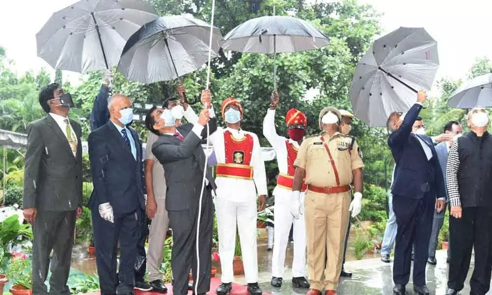 Chief Justice of TS High Court Justice Raghavendra Singh Chauhan unfurling the national flag on occasion of Independence Day in the High Court