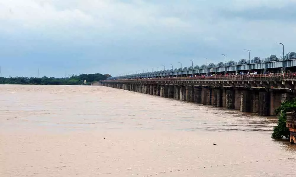 Floodwater being released into the sea from Sir Arthur Cotton Barrage at Dowleswaram on Sunday