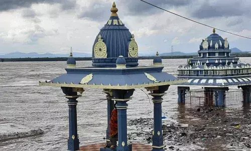 Temples near Godavari River surrounded by floodwater